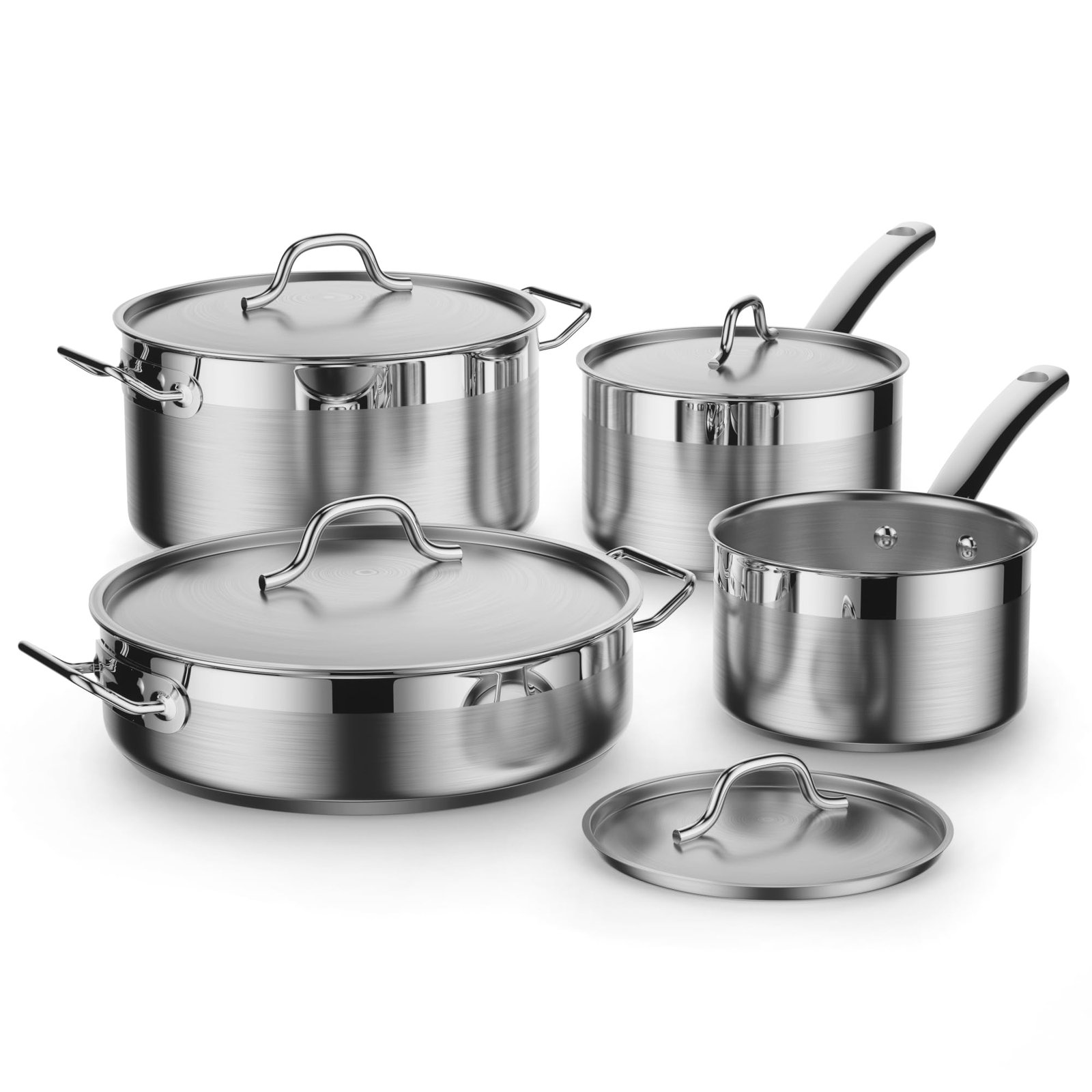 Professional stainless steel and cast iron cookware arranged on a modern kitchen counter